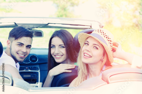 Three friends in cabriolet,...