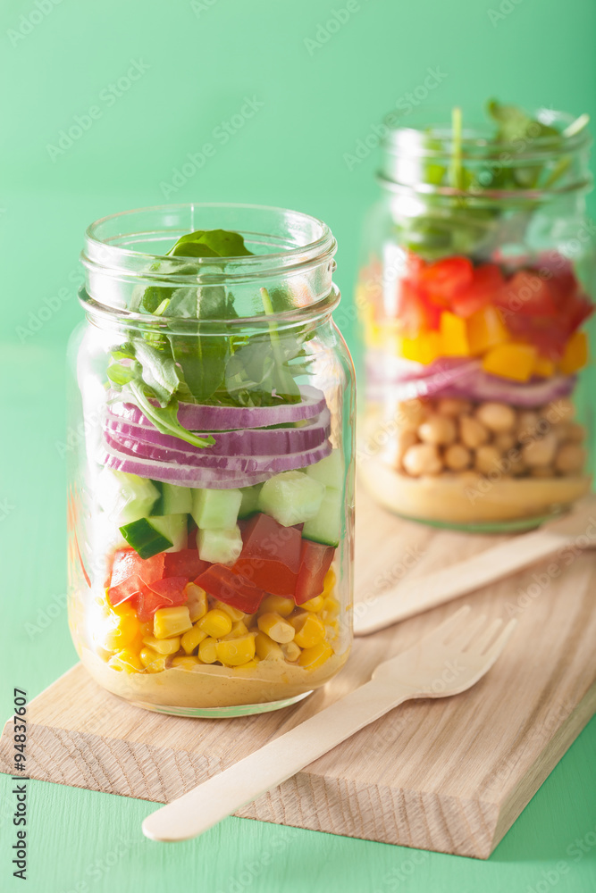 healthy vegetable chickpea salad in mason jar healthy vegetable chickpea salad in mason jar