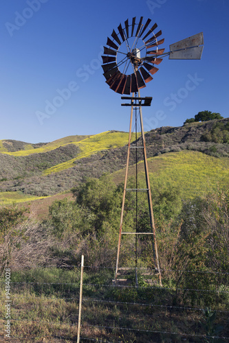 Old wind mill, La Canada' Road in spring, near Ventura, California, USA, 04.26.2014