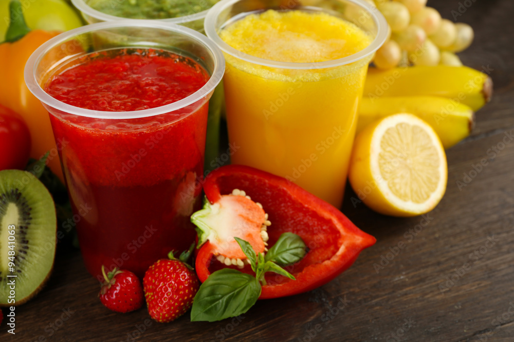 Fresh juice mix fruit, healthy drinks on wooden table background