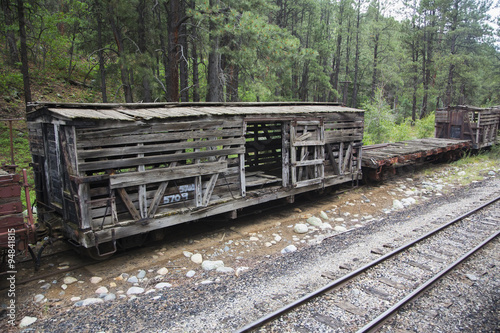 Old box car along Durango and Silverton Narrow Gauge Railroad Steam Engine Train near Durango, Colorado, USA, 07.07.2014 photo