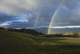 Oak View, California, USA, March 1, 2015, full rainbow over rain storm in Ojai Valley