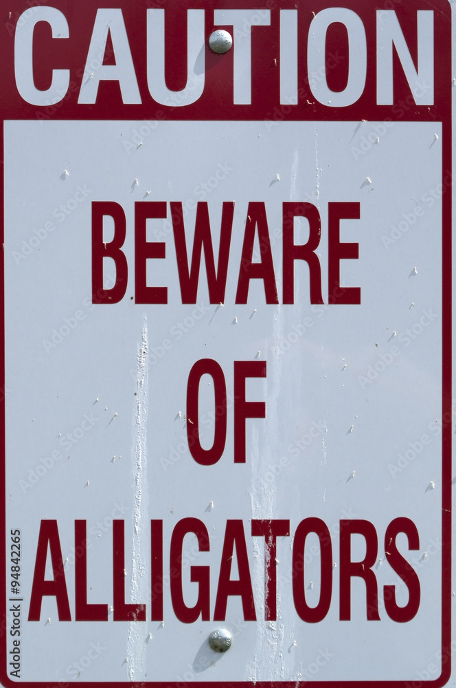 Caution beware of alligators sign Caution beware of alligators sign