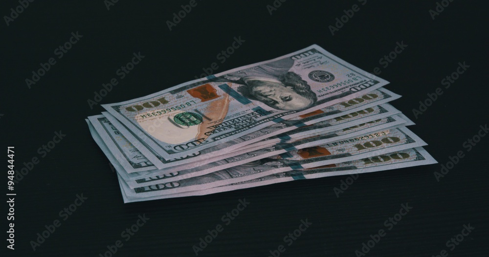 Close-up a 100, 50 and 20 dollars bills. Clous-up and macro shots 4k Close-up a 100, 50 and 20 dollars bills. Clous-up and macro shots 4k