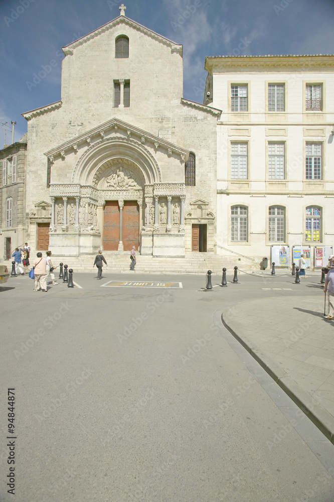 Obraz premium The church of St. Trophime (building w/brown doors), Arles, France