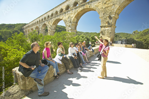 Fototapeta Tourists at the Pont du Gard, Nimes, France