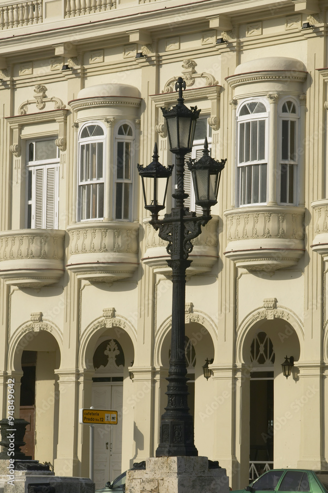Lamppost in foreground with old historic restored buildings of Old Havana, Cuba