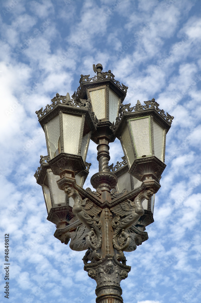 Lampposts and blue sky with puffy clouds in Havana, Cuba