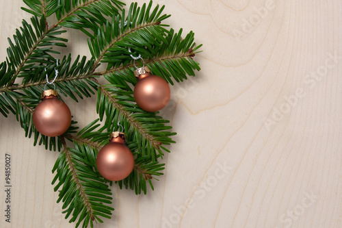 Fir branch decorated with christmas balls
