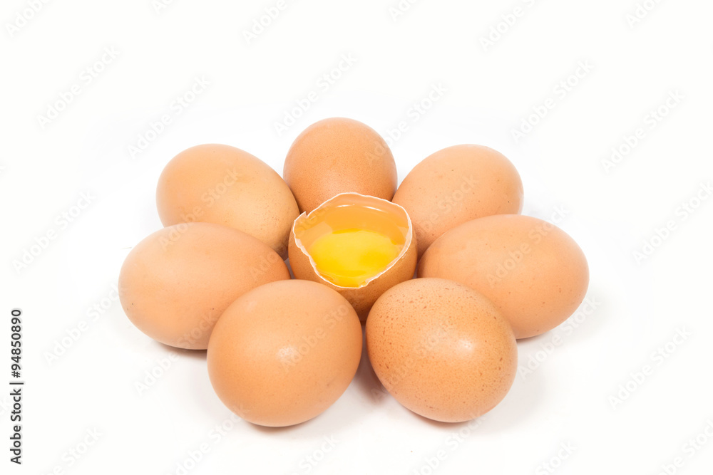 Eggs and the yolk on white background Eggs and the yolk on white background