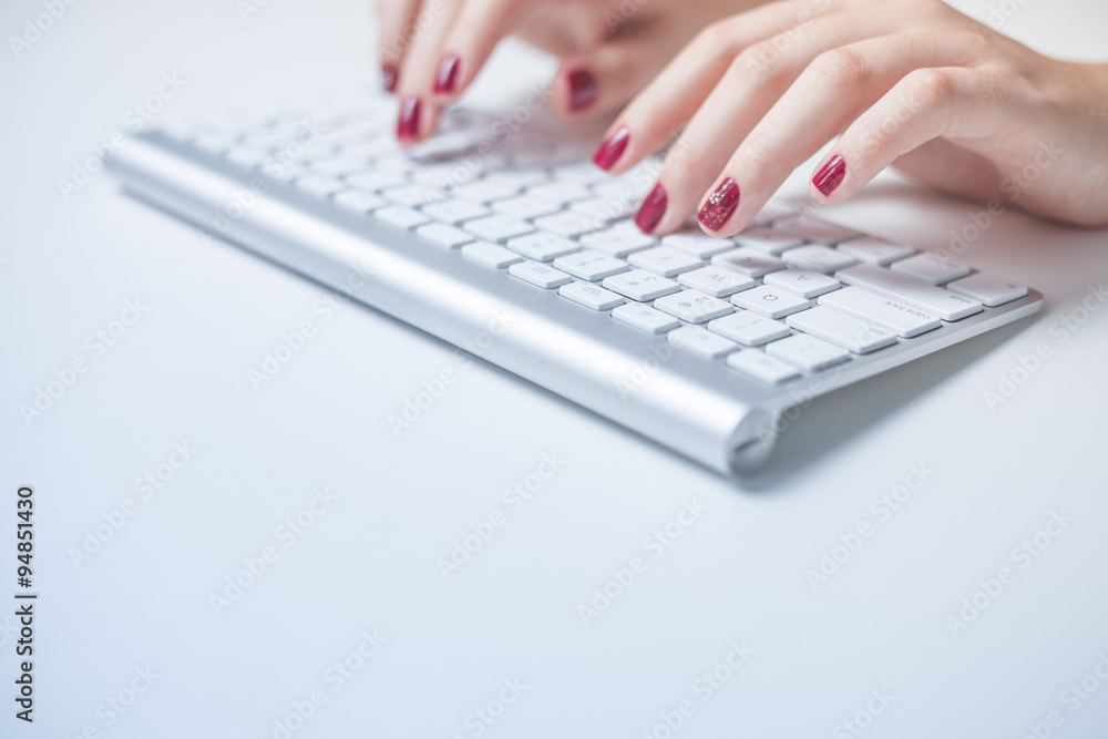 Closeup of business woman hand typing on keyboard Closeup of business woman hand typing on keyboard