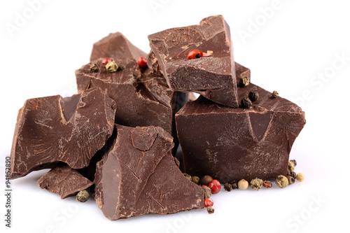 Black chocolate pieces with pepper isolated on white
