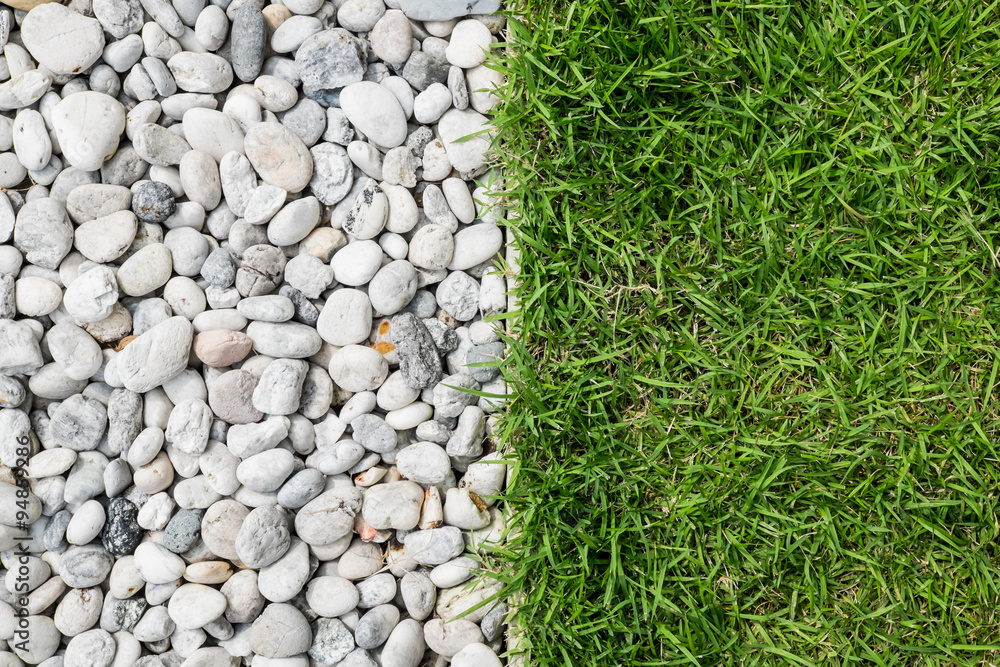 pebble stone and green grass pebble stone and green grass