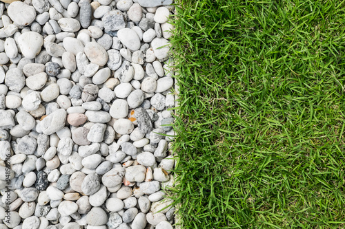 pebble stone and green grass