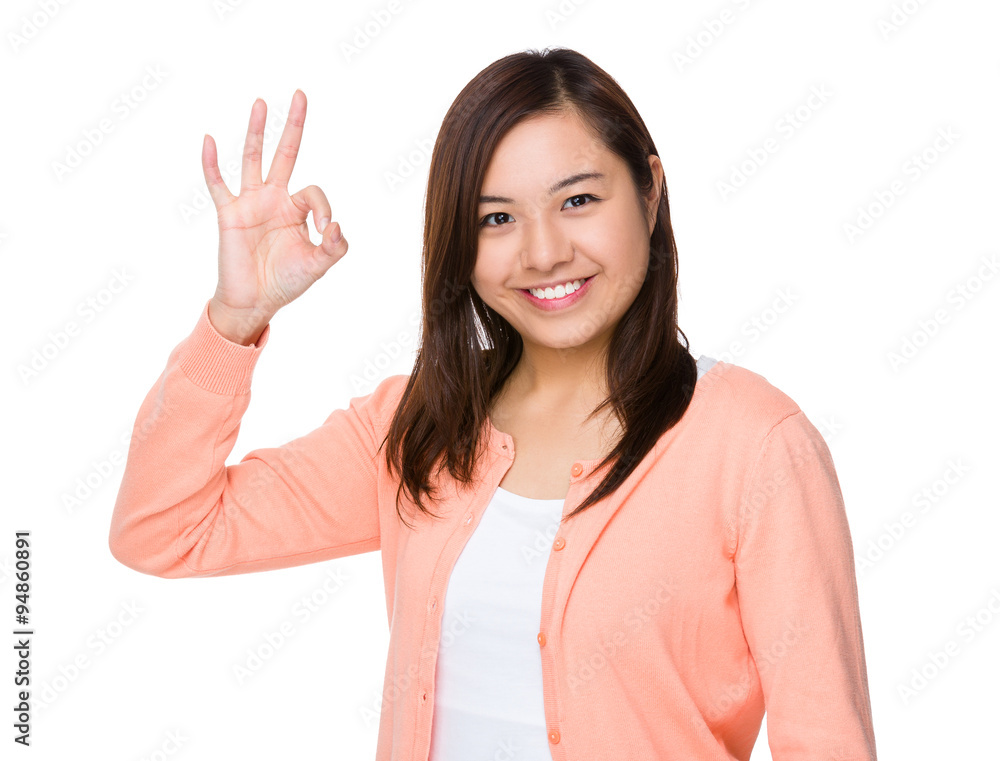 Asian Young Woman with ok sign gesture
