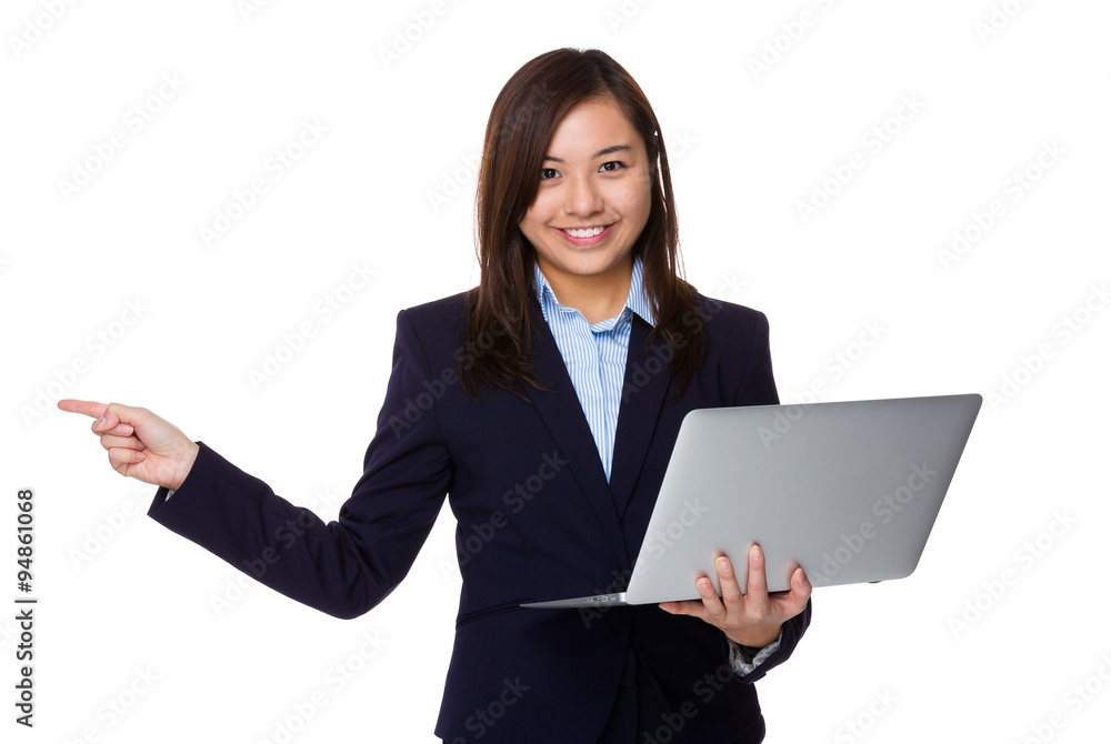 Asian Young Businesswoman hold with laptop computer and finger p Asian Young Businesswoman hold with laptop computer and finger p