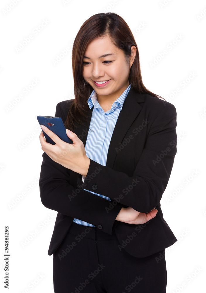 Businesswoman read on the cellphone Businesswoman read on the cellphone