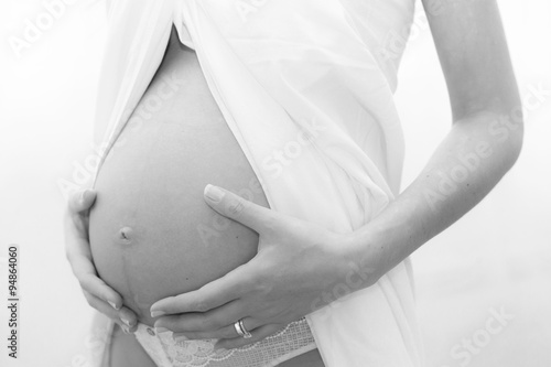 Pregnant Woman with white pareo photo