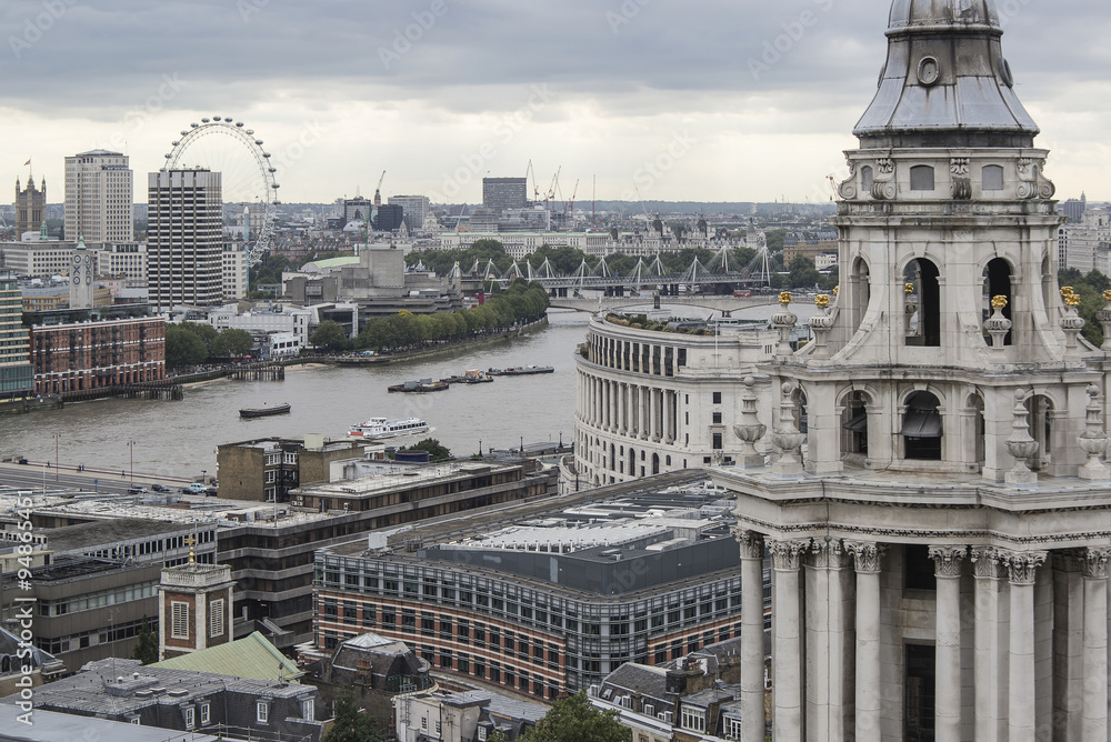 Fototapeta premium London city aerial view over skyline with dramatic sky and landm