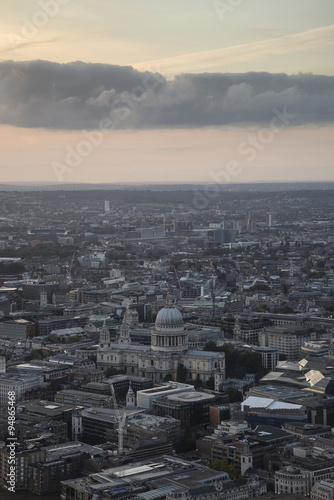 London city aerial view over skyline with dramatic sky and landm