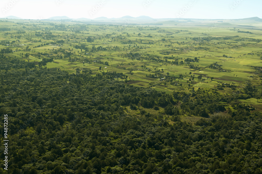 Aerials of Lewa Conservancy showing fence line of protected areas and encroaching farming in Kenya, Africa