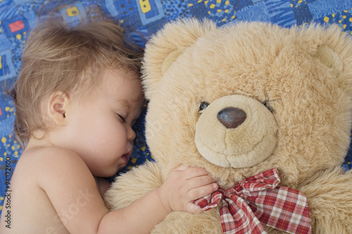 teddy bear and sleeping cute baby