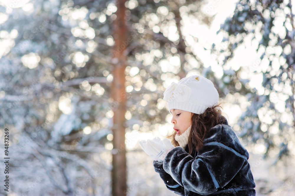 child girl playing with snow on cozy winter forest walk child girl playing with snow on cozy winter forest walk