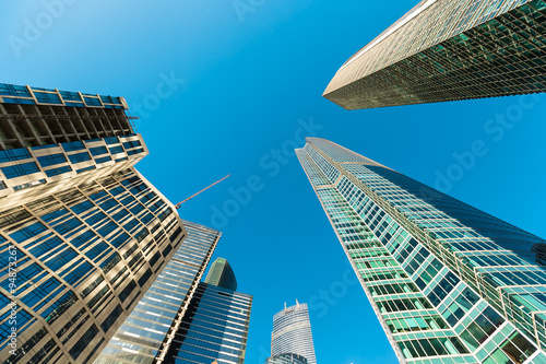 Blue skyscraper facade. office buildings. modern glass silhouett
