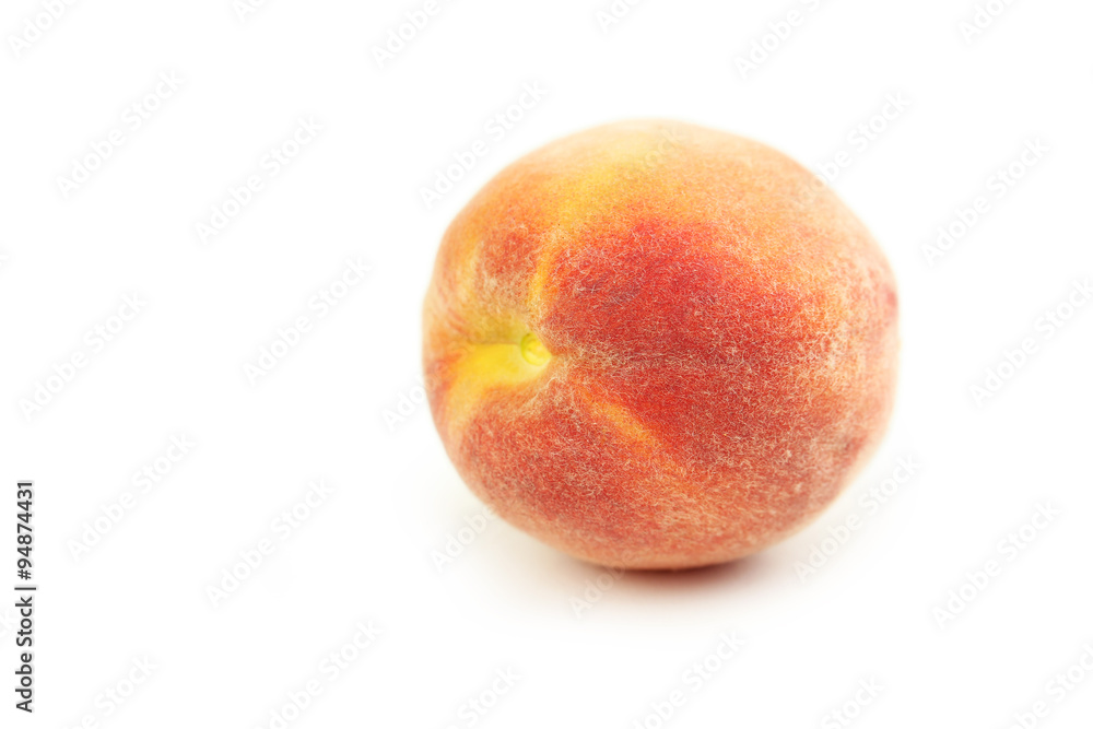 Ripe peach fruit isolated on a white Ripe peach fruit isolated on a white