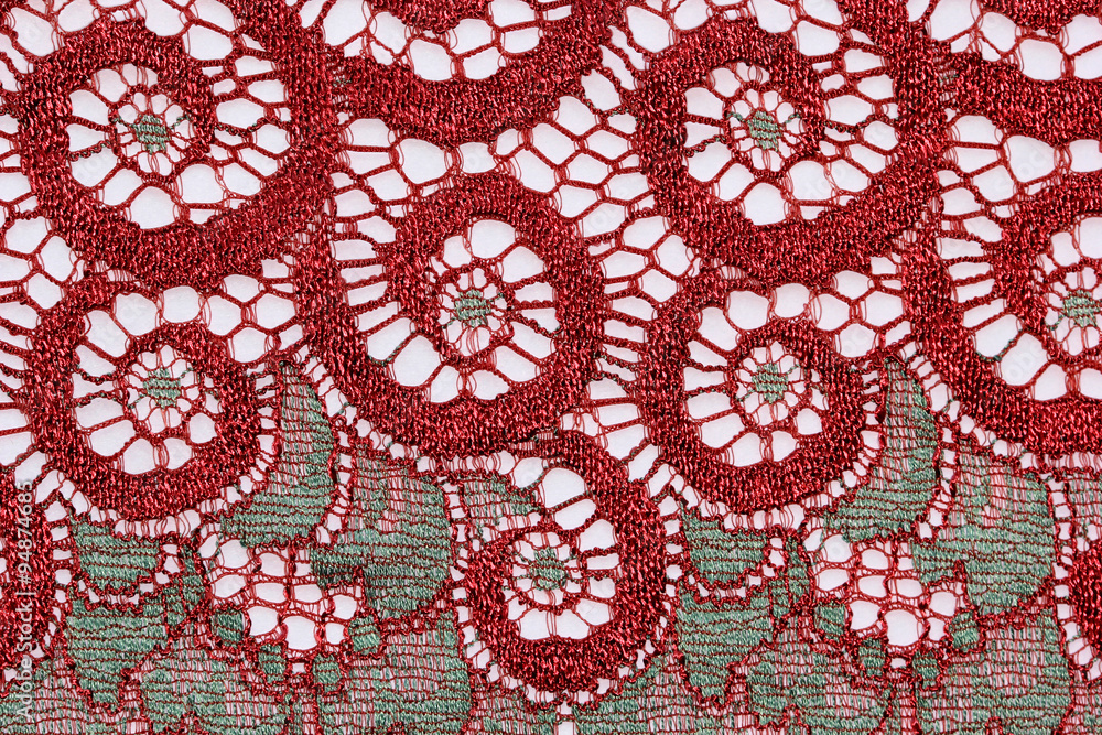 The macro shot of thegrey and red lace texture material The macro shot of thegrey and red lace texture material