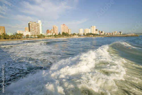 Ocean wave comes in on Durban skyline, South Africa on the Indian Ocean © spiritofamerica