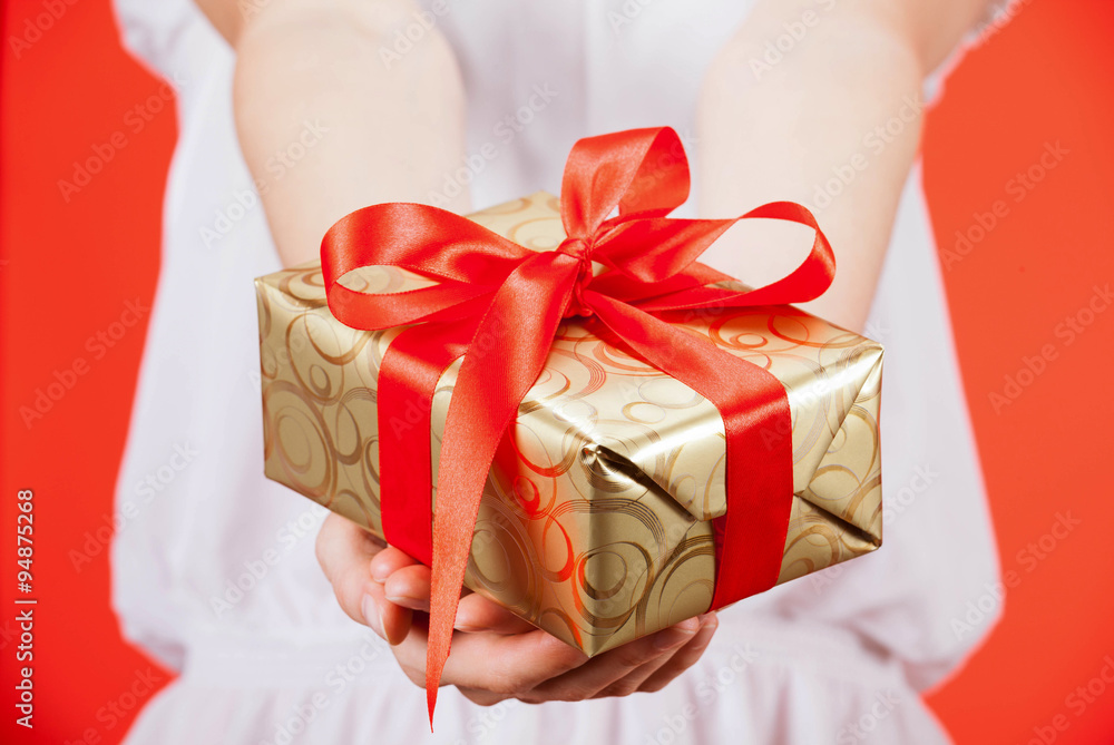 Woman holding a gift Woman holding a gift
