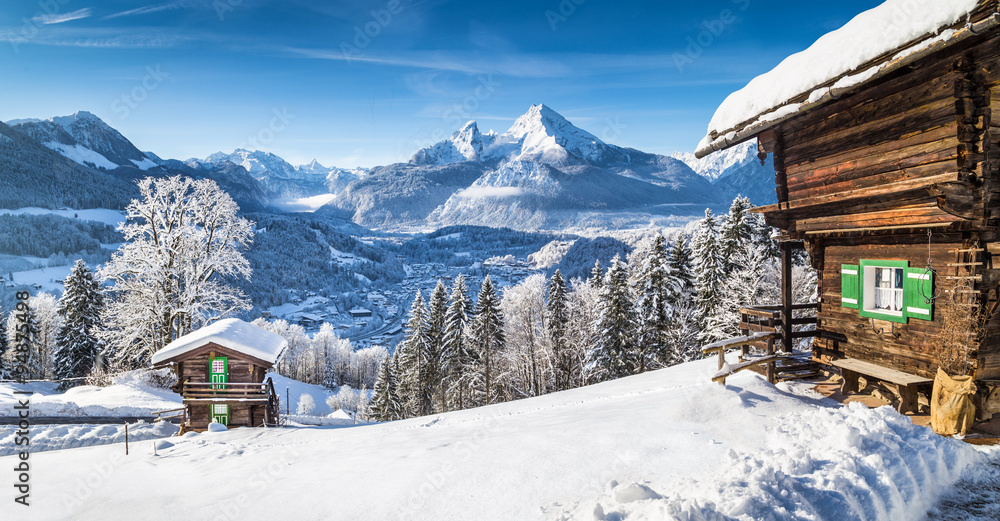 Winter wonderland in the Alps with traditional mountain chalets