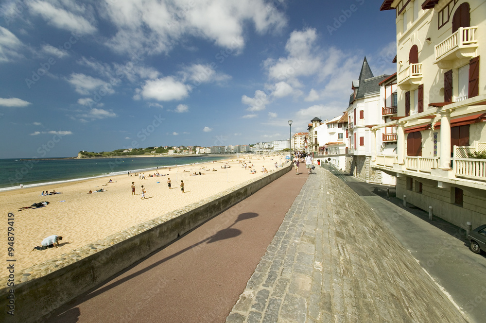A beach boardwalk at St. Jean de Luz, on the Cote Basque, South West France, a typical fishing village in the French-Basque region near the Spanish border