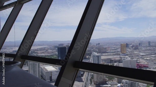 Aerial view from above looking at buildings, mountains and streets of Las Vegas, Nevada, USA