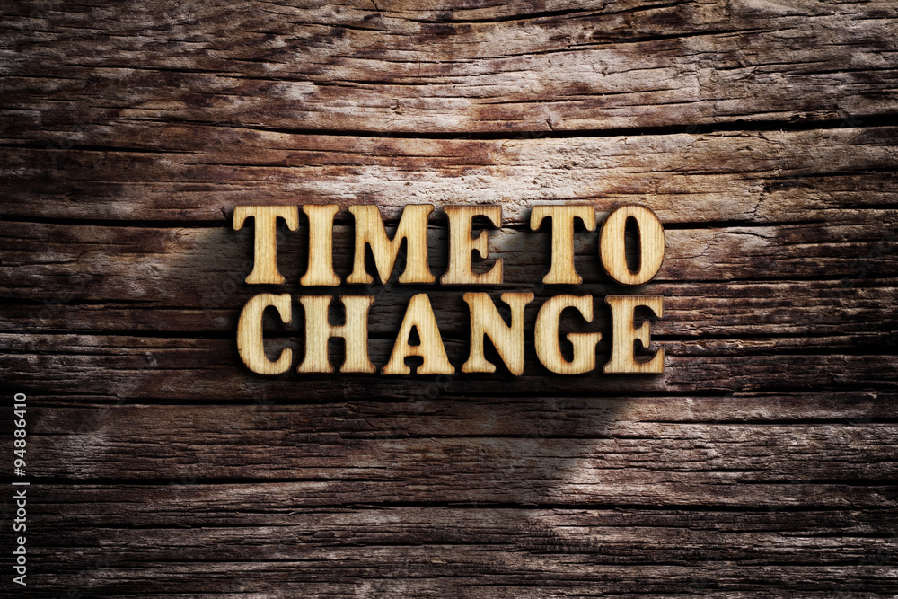 Fototapeta premium Time to change. Words on old wooden board.