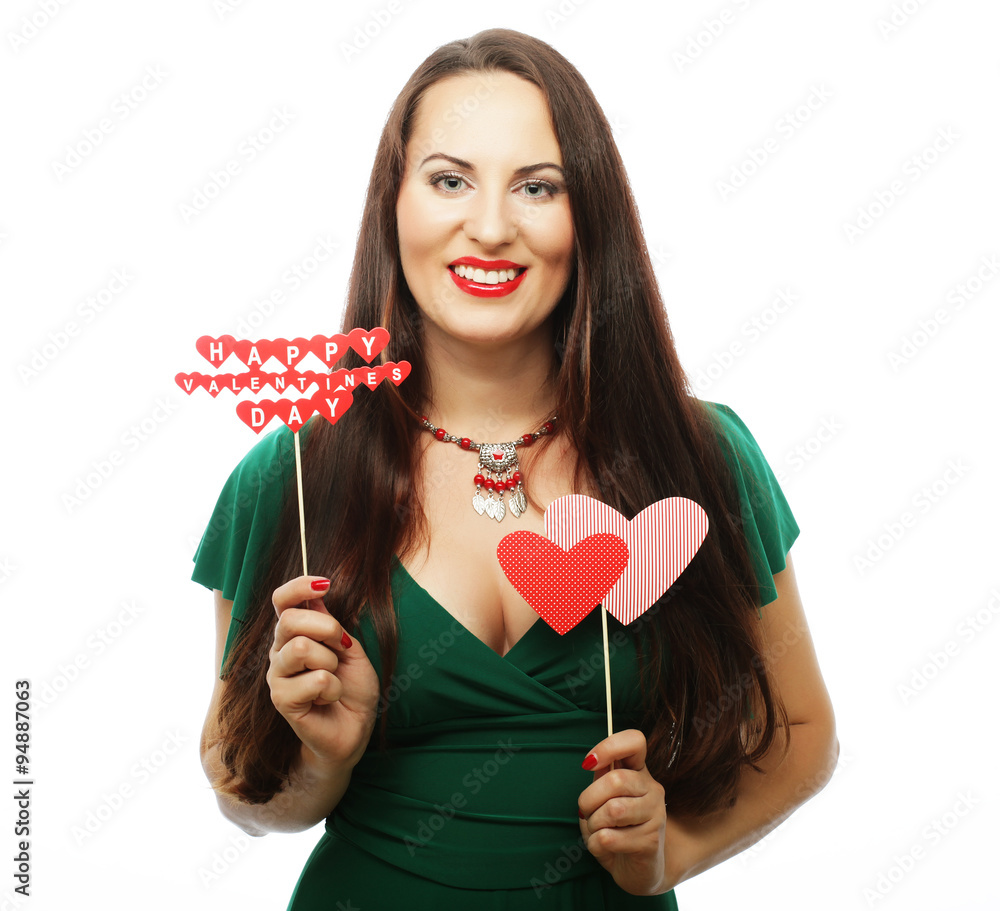 beautiful woman wearing green dress holding paper hearts beautiful woman wearing green dress holding paper hearts