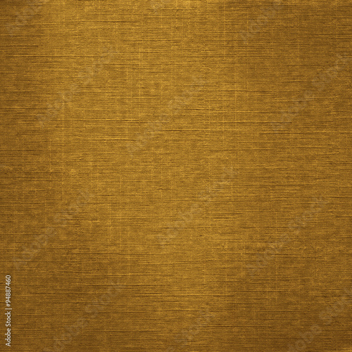 Classic fabric textured background in elegant golden colour 
