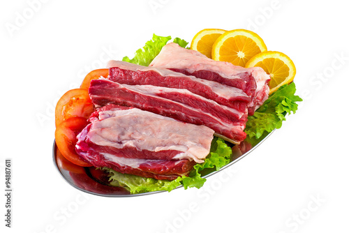 Fresh and raw meat ribs and pork chops isolated on white backgro