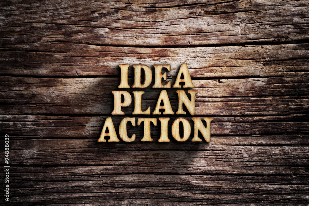 Fototapeta premium Idea Plan Action. Words on old wooden board.