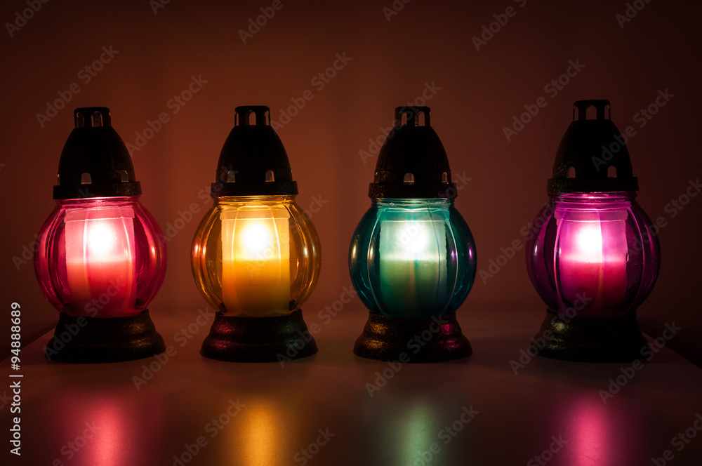 Burning votive candles in the dark Stock Photo Adobe Stock