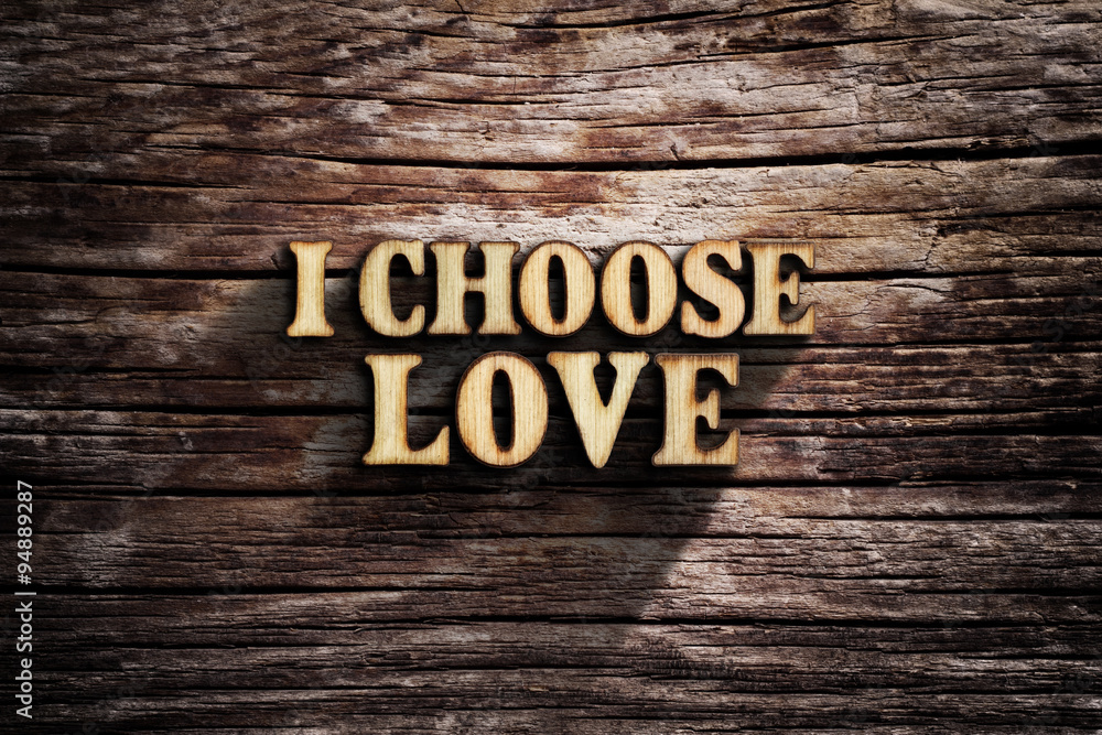 Fototapeta premium I choose Love. Words on old wooden board.