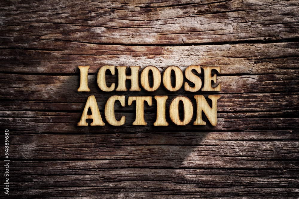 Fototapeta premium I choose Action. Words on old wooden board.