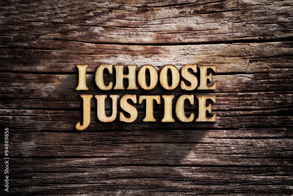 Naklejka premium I choose Justice. Words on old wooden board.
