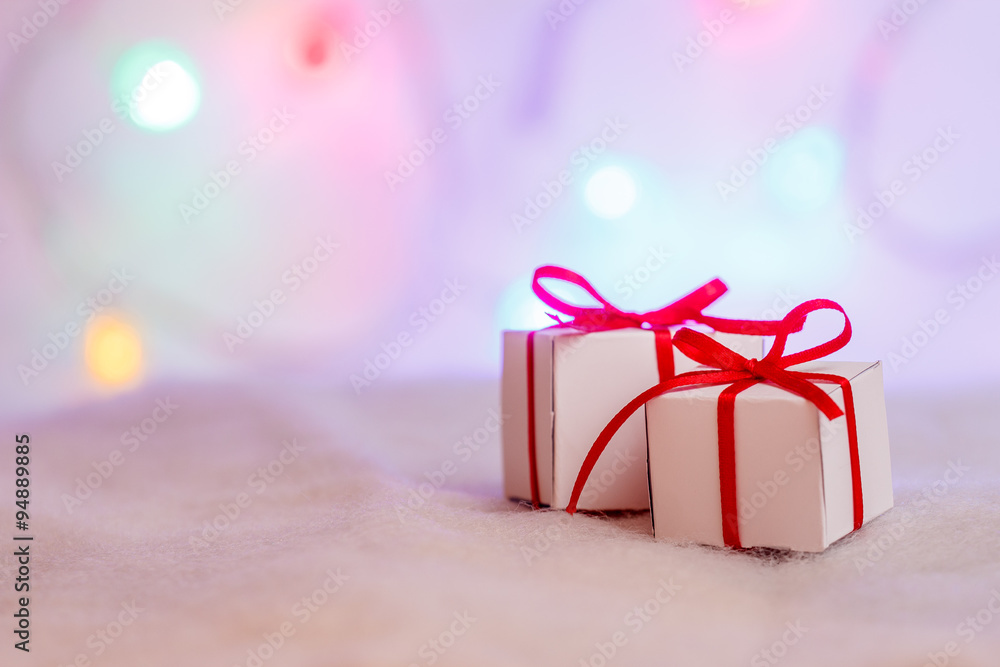 Decorated Christmas gifts on abstract background Decorated Christmas gifts on abstract background