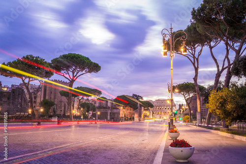 Canvas Print Abstract dark artistic edit of Roman forum at dawn with the Colosseum in the bac