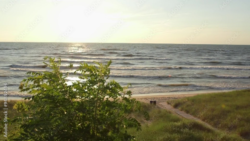 Summer sunset on the shores of Lake Michigan Summer sunset on the shores of Lake Michigan