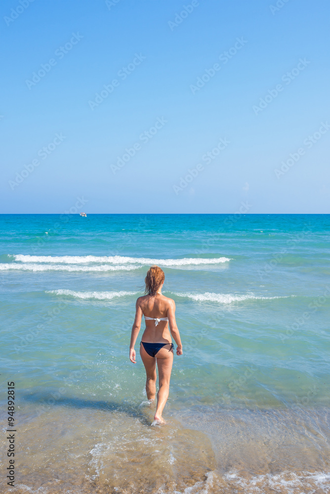 An attractive young woman at the beach An attractive young woman at the beach