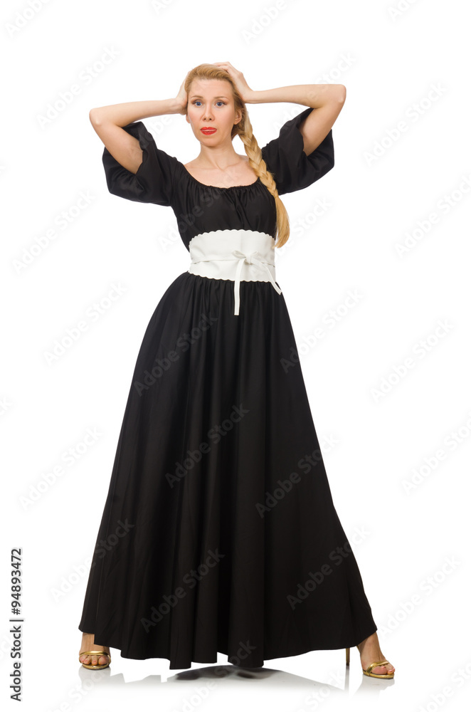 Tall woman in long black dress isolated on white