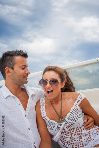 couple on their yacht at sea